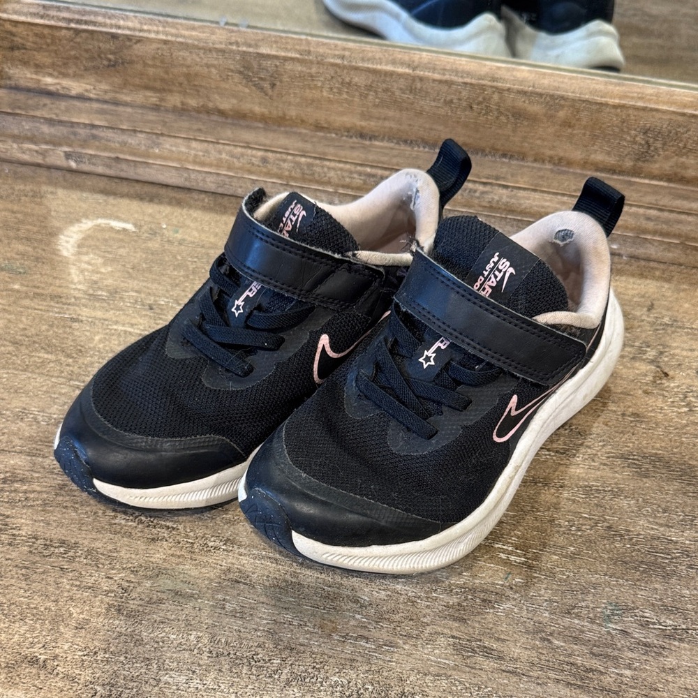 Nike Kids Black Sneakers with Pink Swoosh